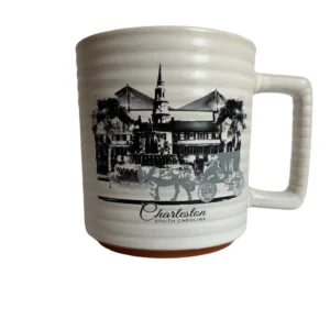 Charleston mug with historic city scene illustration.