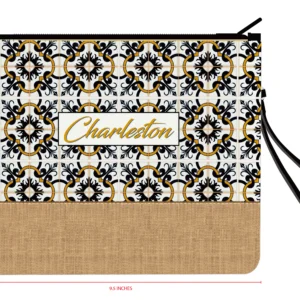 Patterned pouch with "Charleston" and wrist strap.