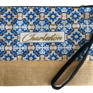 Patterned clutch bag with "Charleston" text.